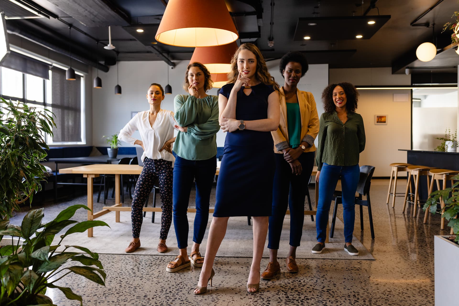 Portrait of diverse female colleagues in casual meeting in office