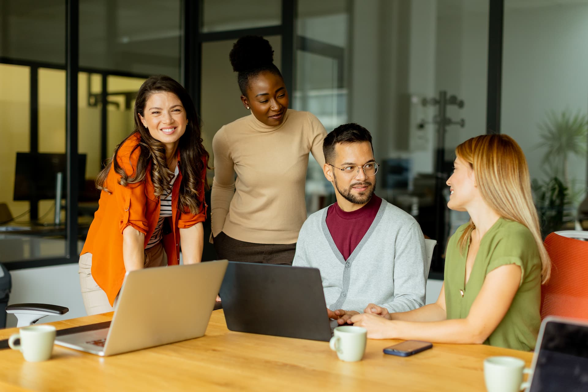 Young multiethnic startup team working in the modern office